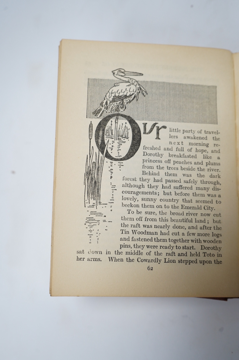 Baum, Frank - The Wizard of Oz, illustrated by W.W. Denslow, 12mo, pictorial front board over red cloth, Hutchinson & Co, London, [1926].